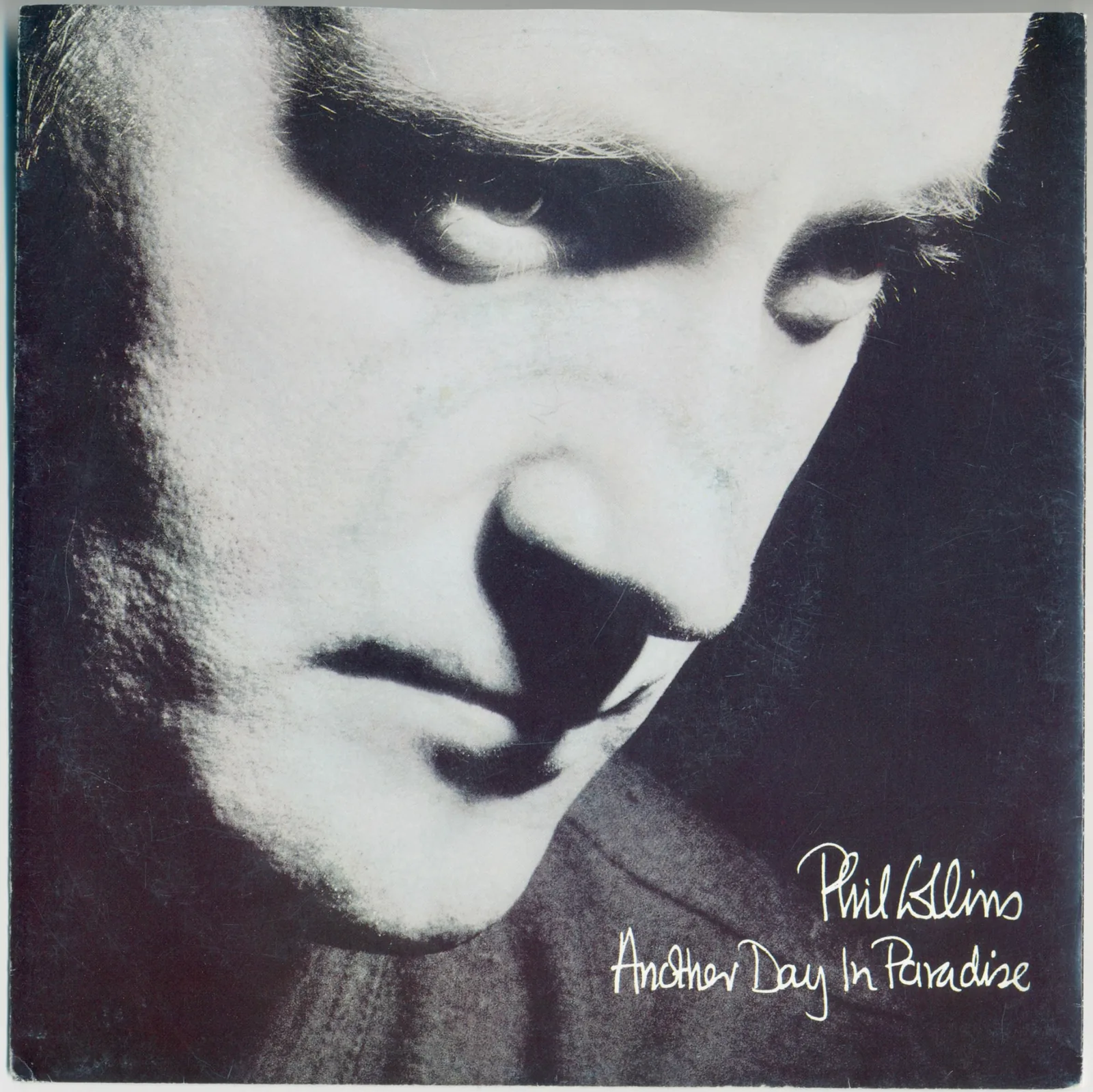 Another Day In Paradise – Phil Collins